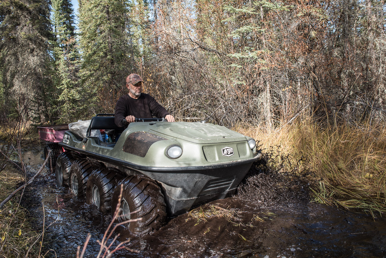 Argo driving through mud in Yukon